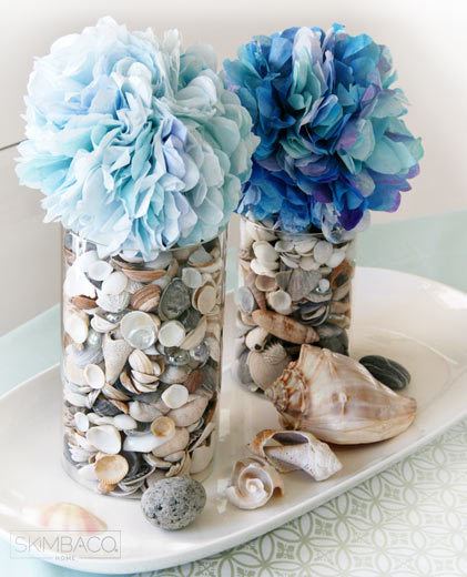 Coffee filter pom poms / flowers are inexpensive way to decorate your home, and they are great for party decorating or seasonal decorating. The essential oils add fragrance to these pom poms and they freshen the air too!