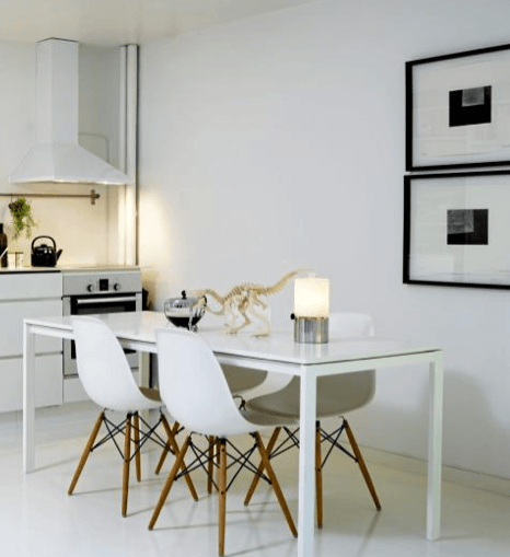 modern white dining table with Eames chairs