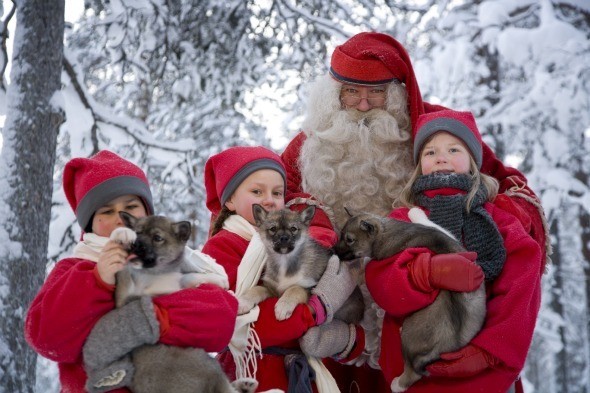Santa and Elves in Rovaniemi by Visit Rovaniemi
