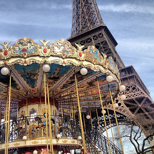 carousel under Eiffel towr. Instagram travel photo by @skimbaco