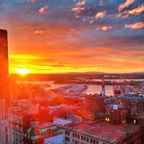 Montreal sunrise as seen from the window of InterContinental Hotel Montreal. Instagram photo by @skimbaco