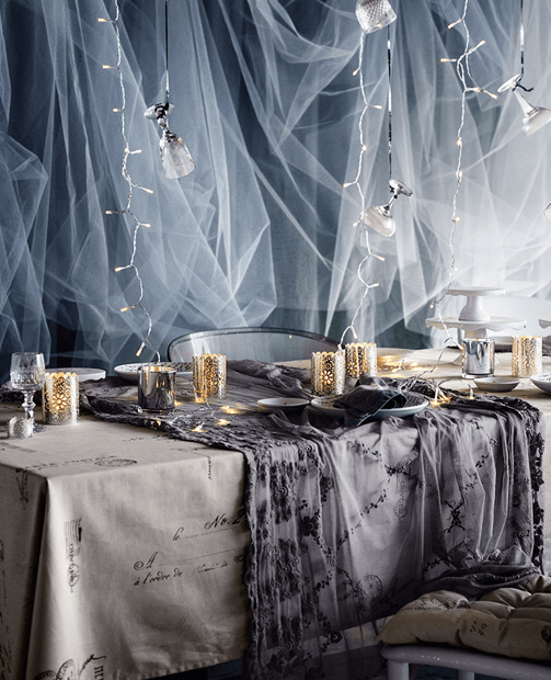 silver and grey table setting for the holidays