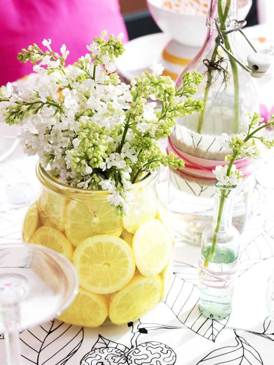 decorate with fruits: lemons in a flower vase