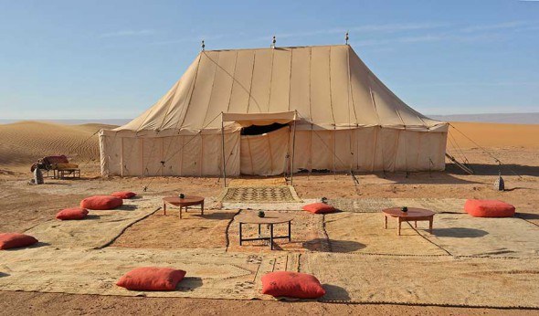 The restaurant tent at the Erg Chegaga Luxury Desert Camp in Sahara desert, Morocco
