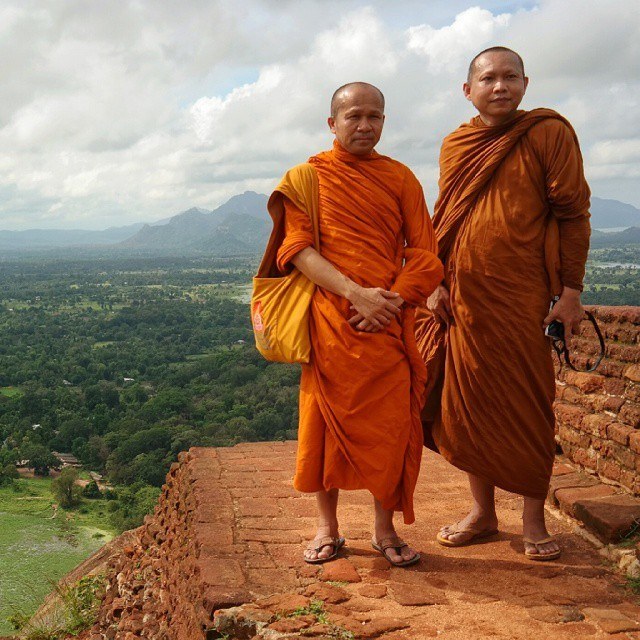 sri lanka monks at sigiriya rock