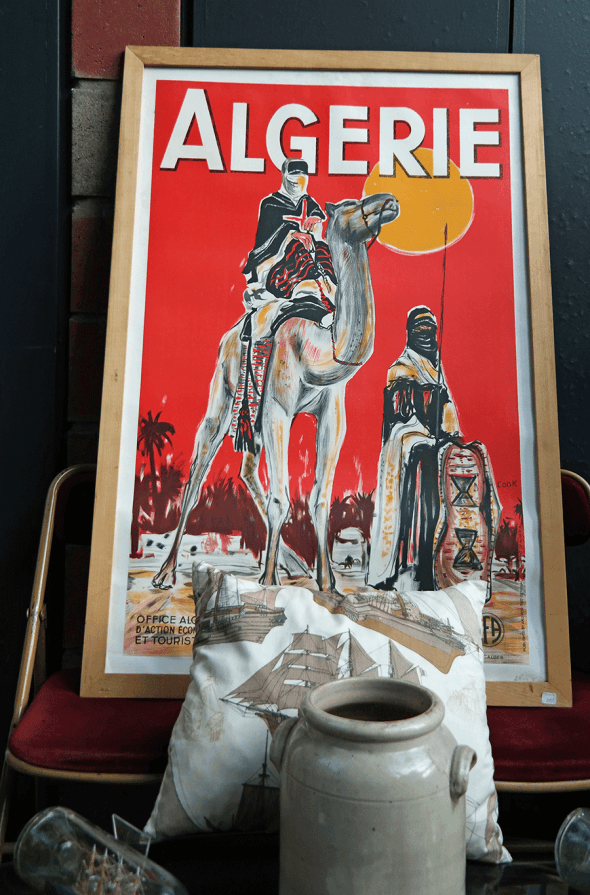 Travel posters are a great way to decorate. Find them from flea markets!