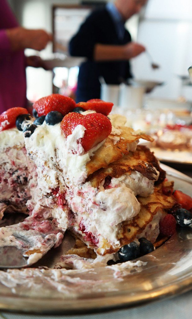 Pancake cake with berries in Swedish Smörgåsbord dessert table | Travel feature by @skimbaco