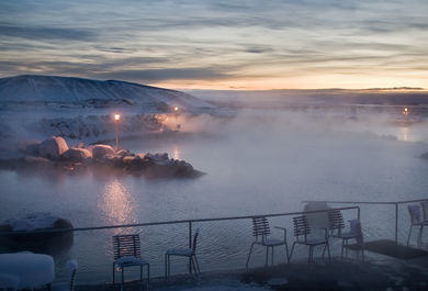 natural pool waters of a geothermal spa, in the lava fields coupled with jaw-dropping views of the grand Lake Myvatn.