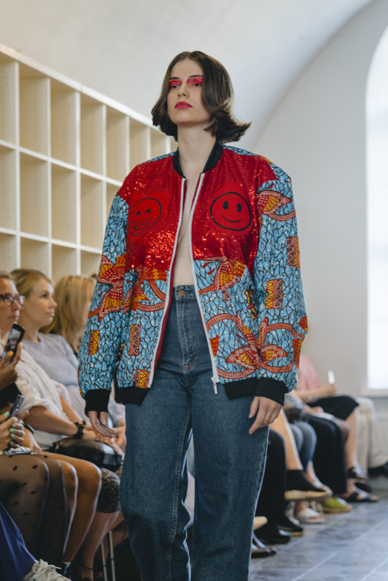 Boie and Bill red bomber jacket at Helsinki Fashion Week 2023, model isabella presnal